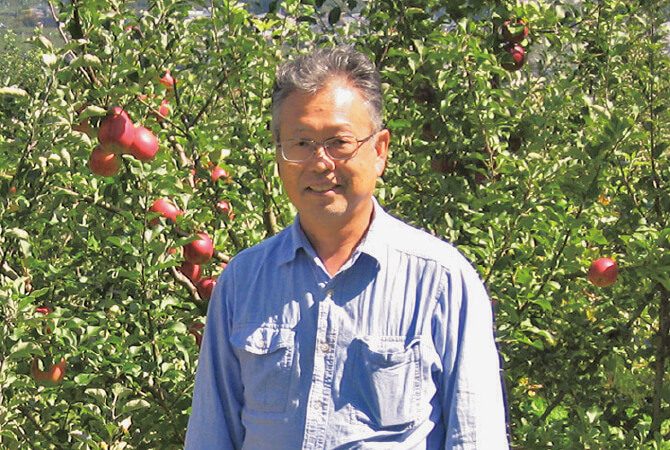りんご農家の田中光明さん63歳